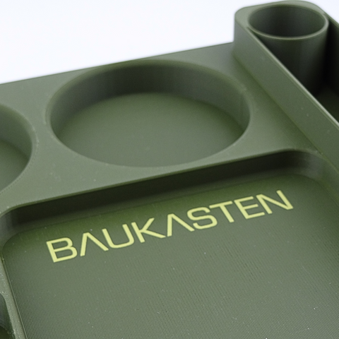 Baustelle gruen closeup logo